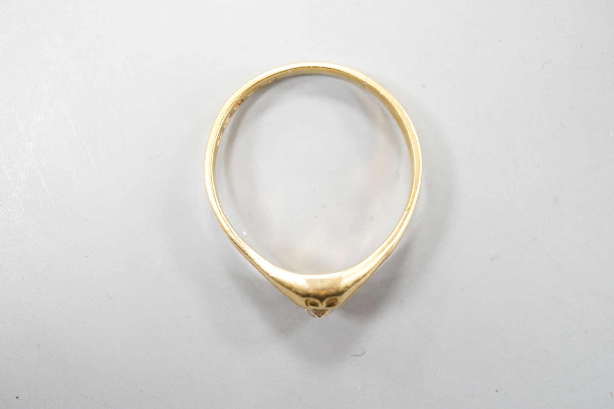 A Victorian 22ct gold and solitaire diamond set ring, London, 1875, size Z, gross weight 5 grams